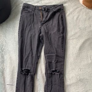 Ripped black rue 21 jeans, full length.